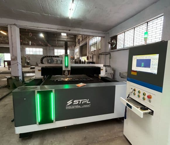 CNC laser cutting machine cutting metal sheets