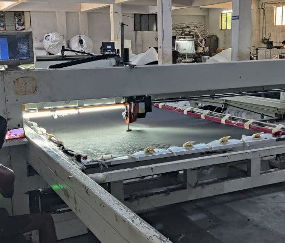 Industrial quilting machine on the production floor