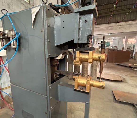 Spot welding equipment in industrial workshop